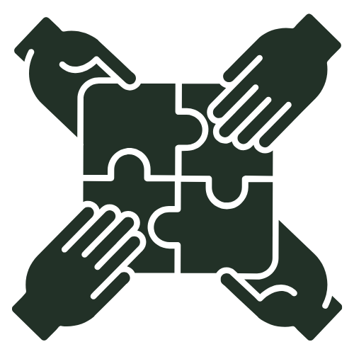 An icon featuring four hands coming together to assemble a square-shaped puzzle with four interlocking pieces. The design, in a solid dark color, symbolizes collaboration, teamwork, and problem-solving.